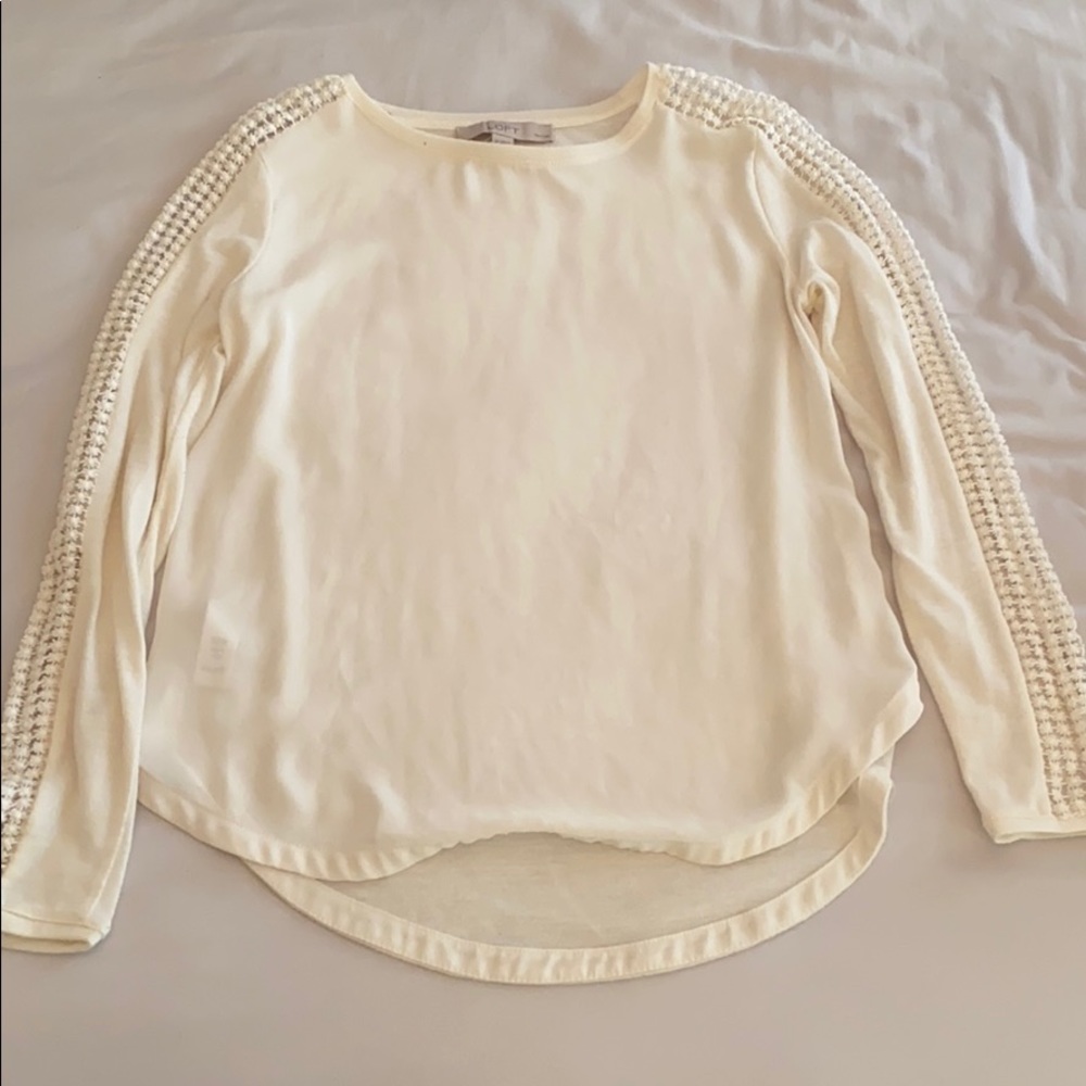 Cream colored long-sleeve top from Loft